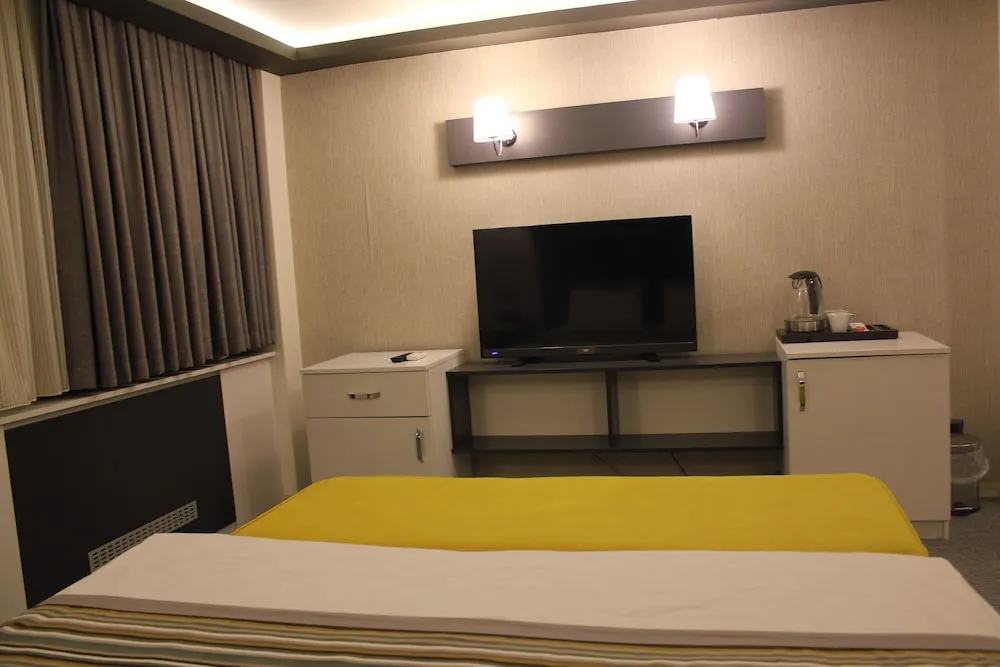 Deluxe Üç Kişilik Oda