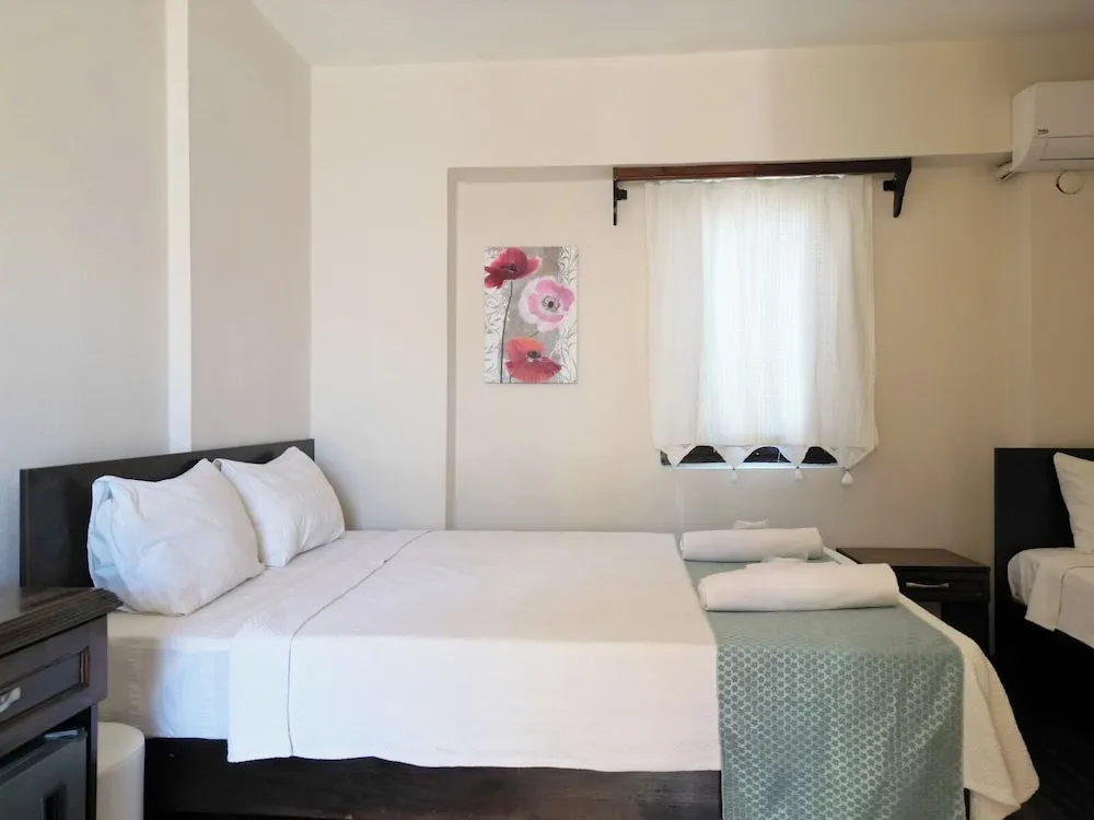 Deluxe Üç Kişilik Oda