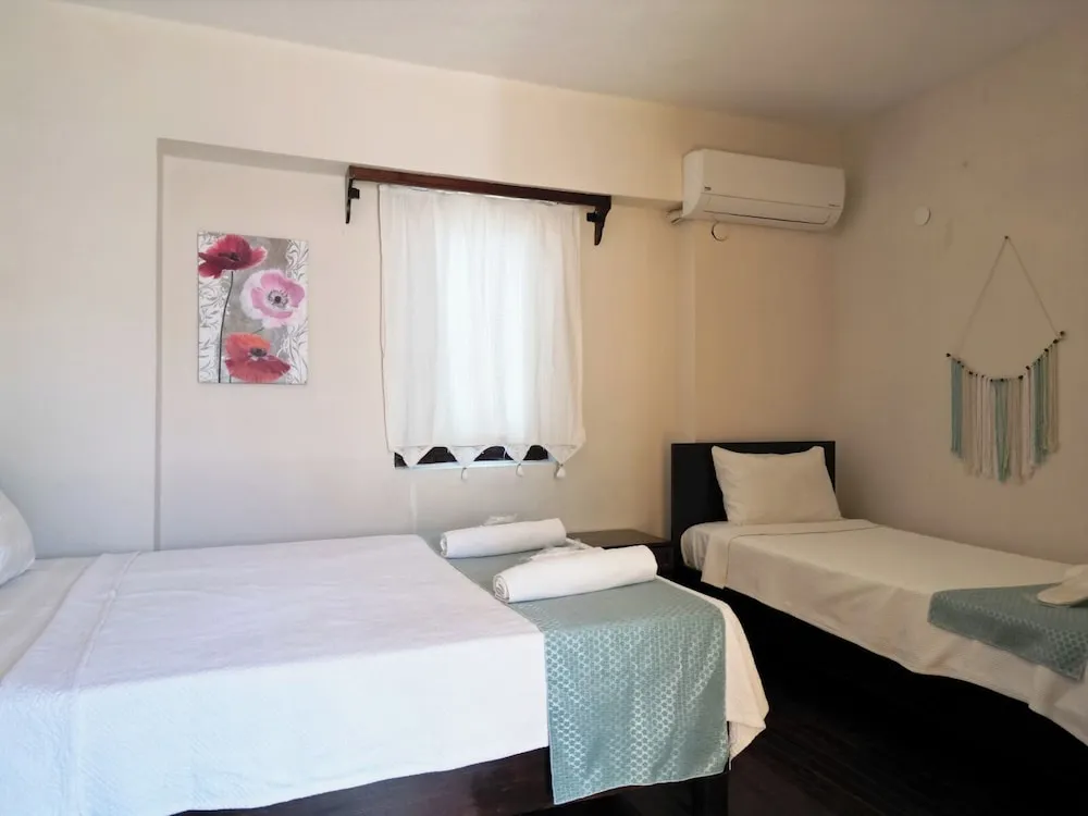 Deluxe Üç Kişilik Oda