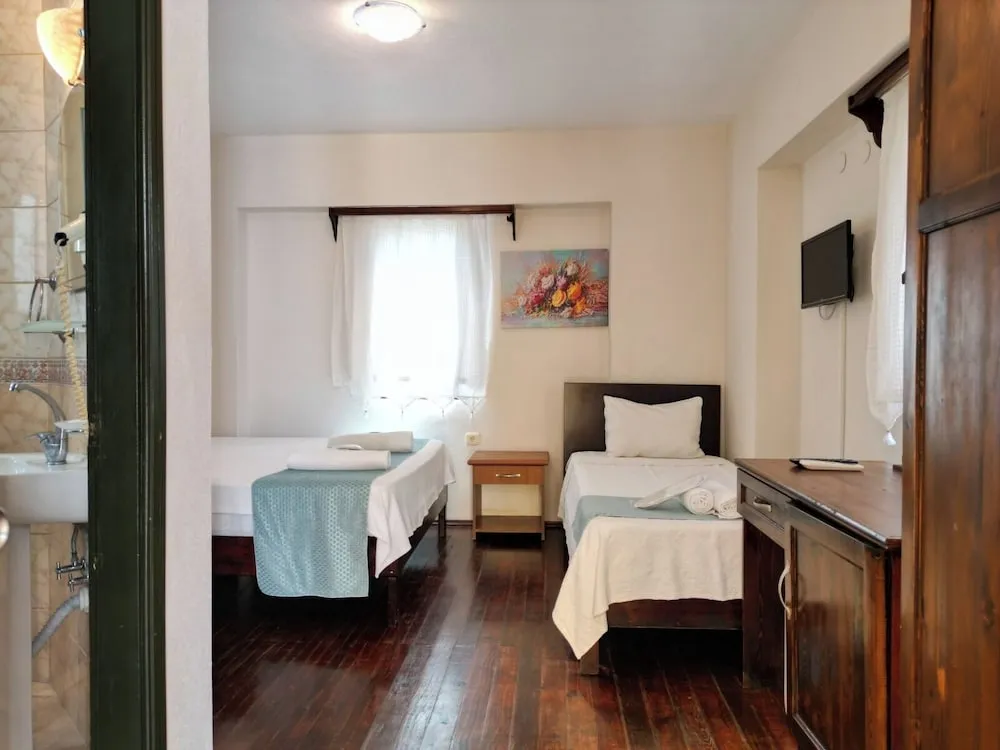 Deluxe Üç Kişilik Oda