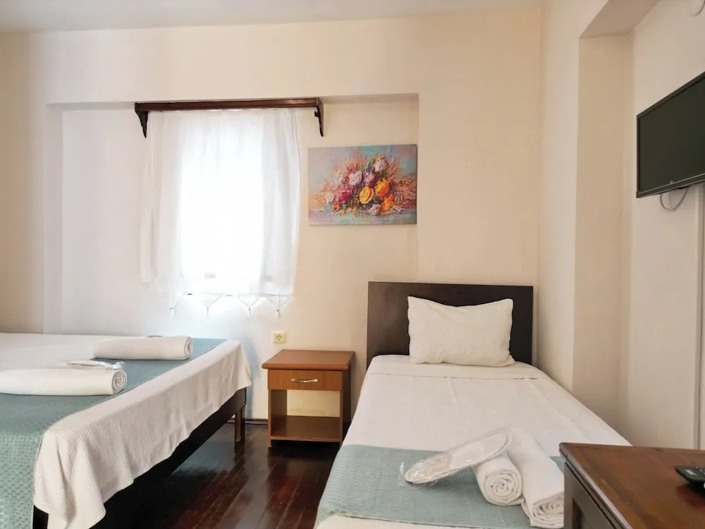 Deluxe Üç Kişilik Oda