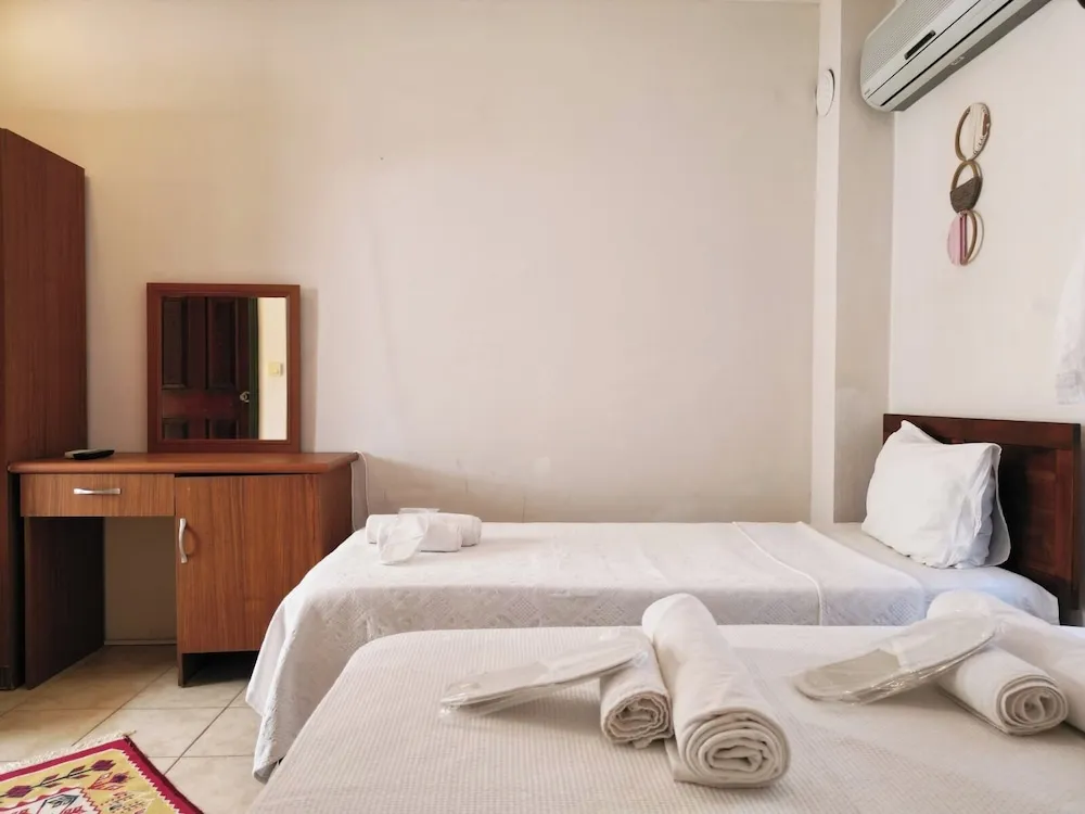 Economy Üç Kişilik Oda