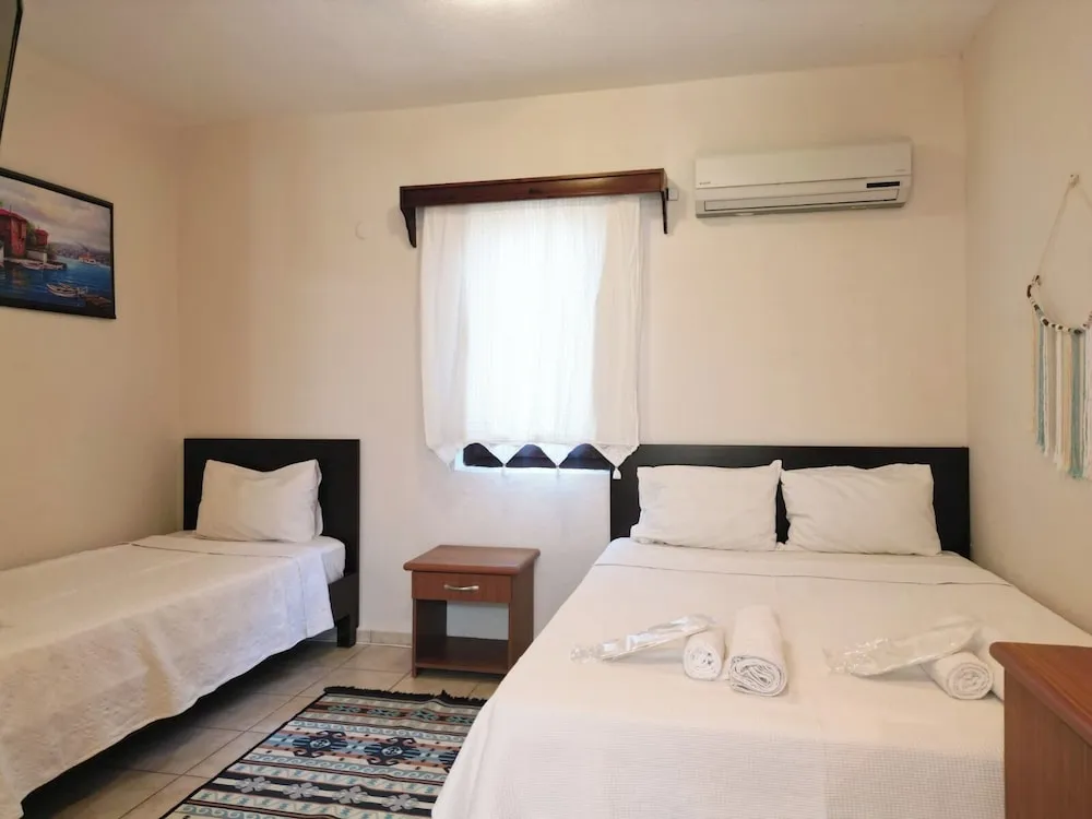 Economy Üç Kişilik Oda