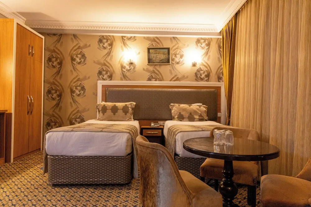 Deluxe Dört Kişilik Oda