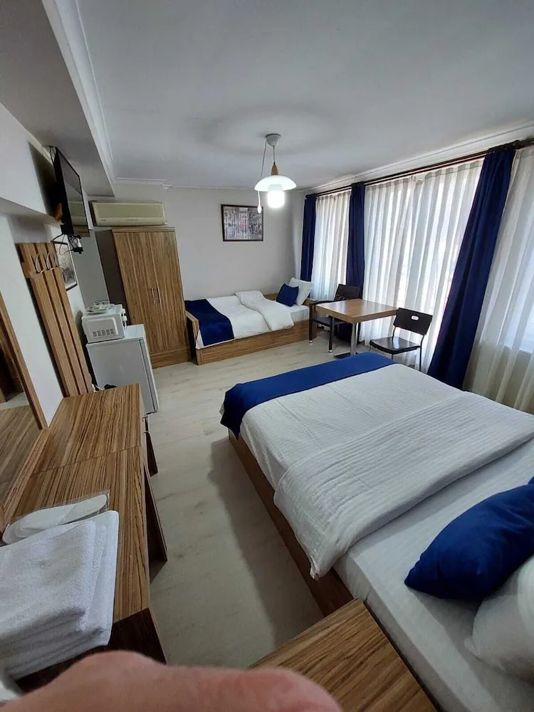 Deluxe Üç Kişilik Oda