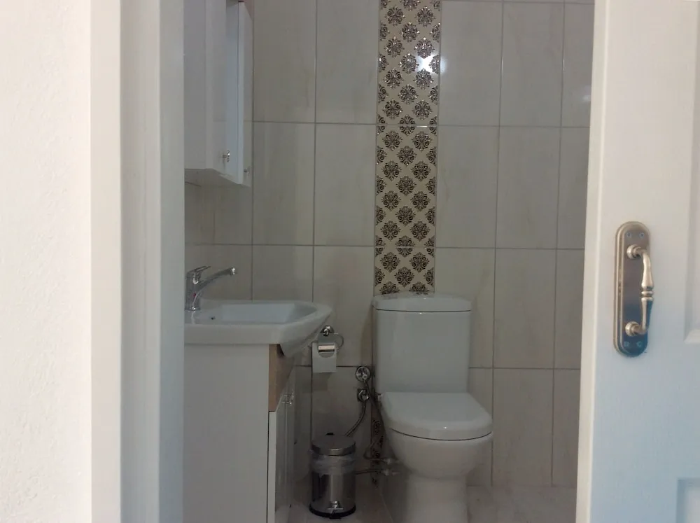 Üç Kişilik Oda, Balkon, Bahçe Manzaralı
