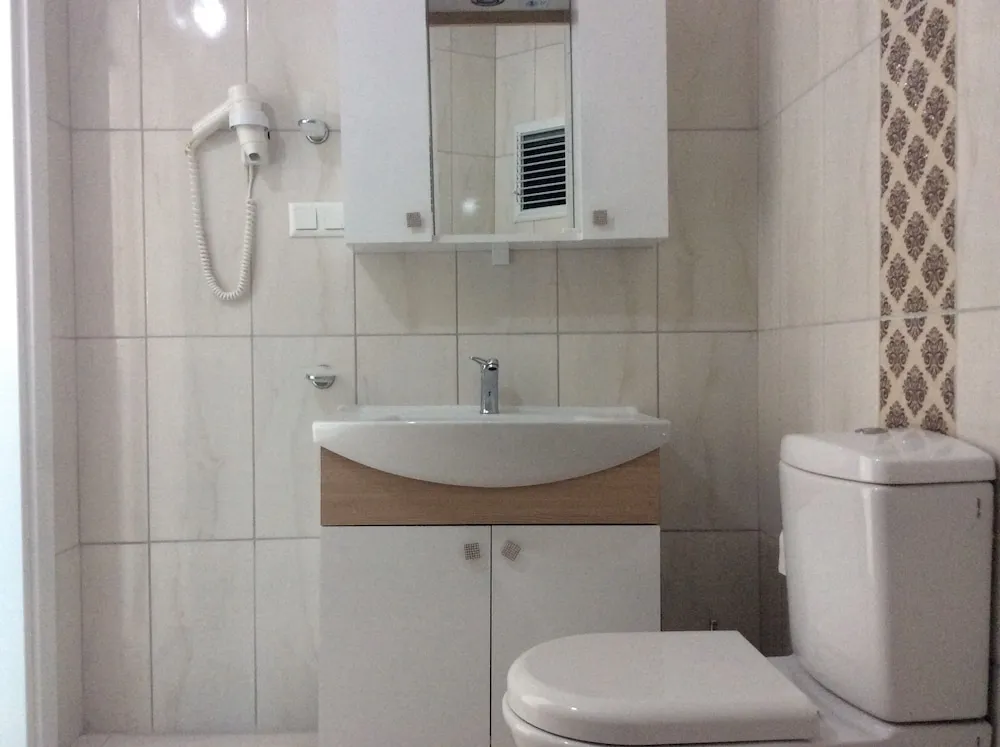 Üç Kişilik Oda, Balkon, Bahçe Manzaralı