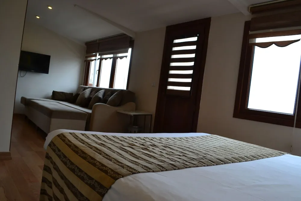 Deluxe Üç Kişilik Oda, Deniz Manzaralı