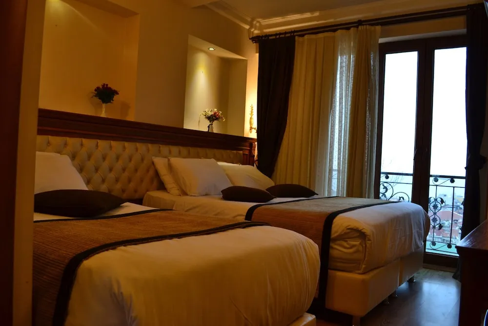 Deluxe Üç Kişilik Oda, Deniz Manzaralı
