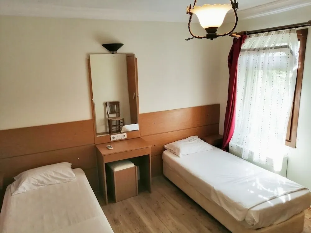 Üç Kişilik Oda