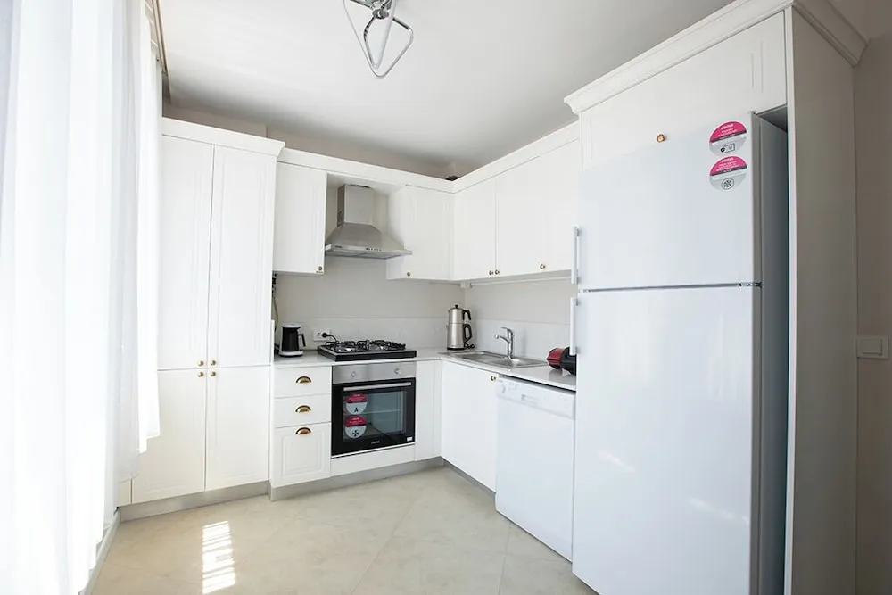 Executive Serviced Apartments with One King and Two Single Beds and a Private Balcony