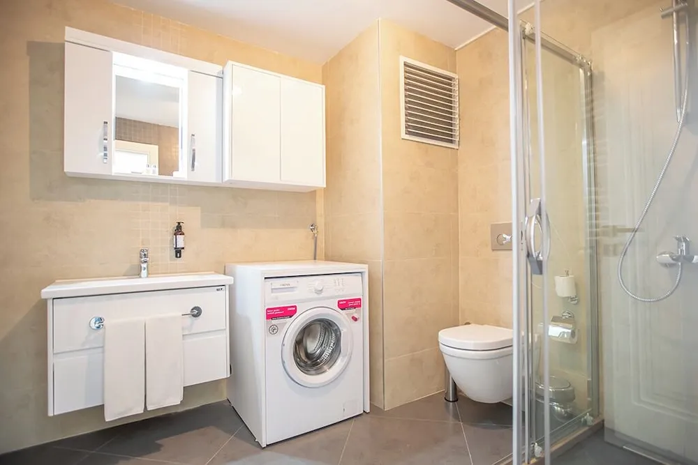 Executive Serviced Apartments with One King and Two Single Beds and a Private Balcony
