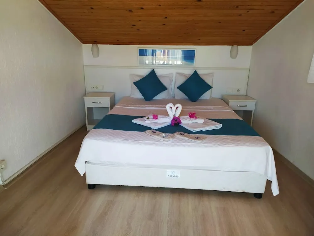Deluxe Çatı Katı (Loft), 1 Yatak Odası, Şömine, Deniz Manzaralı