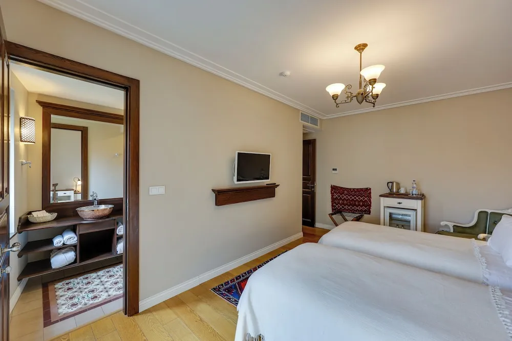 Deluxe Tek Büyük veya İki Ayrı Yataklı Oda