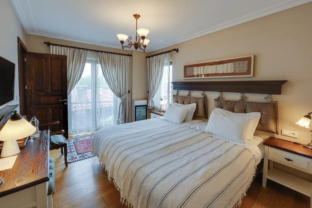 Deluxe Tek Büyük veya İki Ayrı Yataklı Oda
