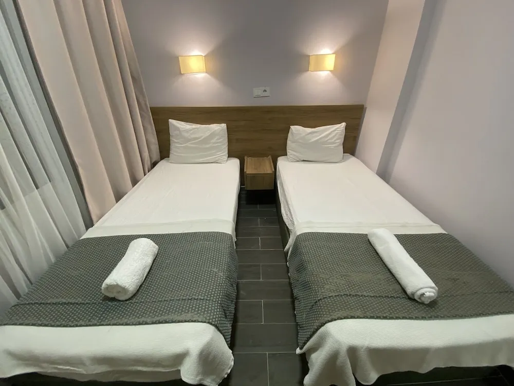 Comfort Tek Büyük veya İki Ayrı Yataklı Oda, 1 Çift Kişilik veya 2 Tek Kişilik Yatak