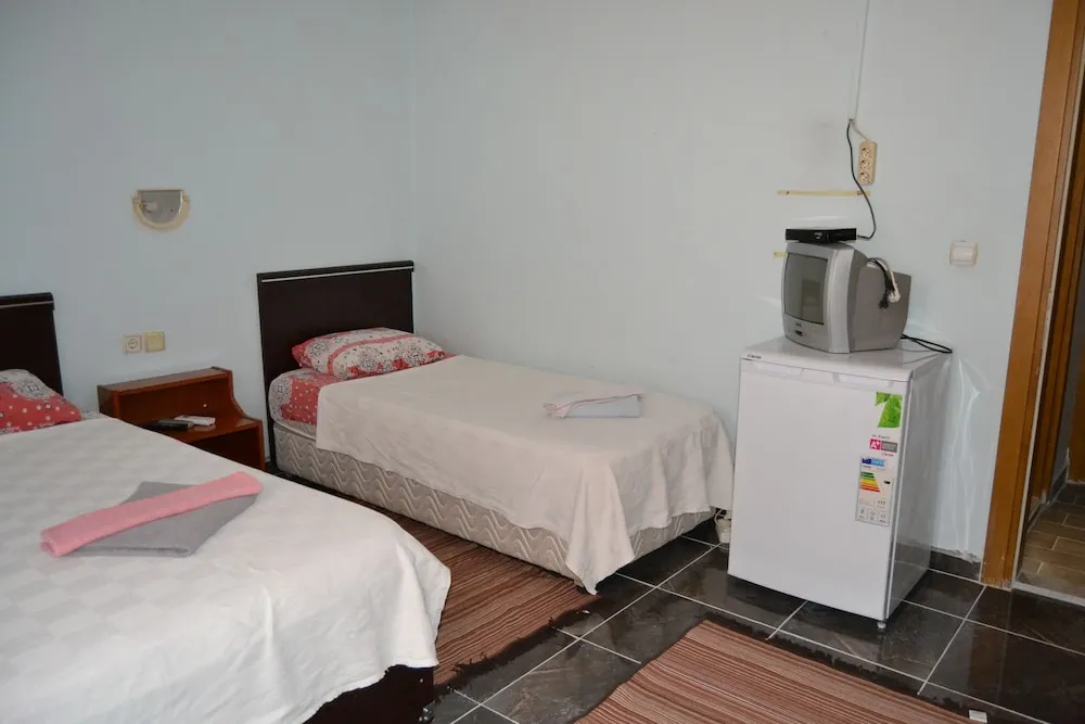 Üç Kişilik Oda