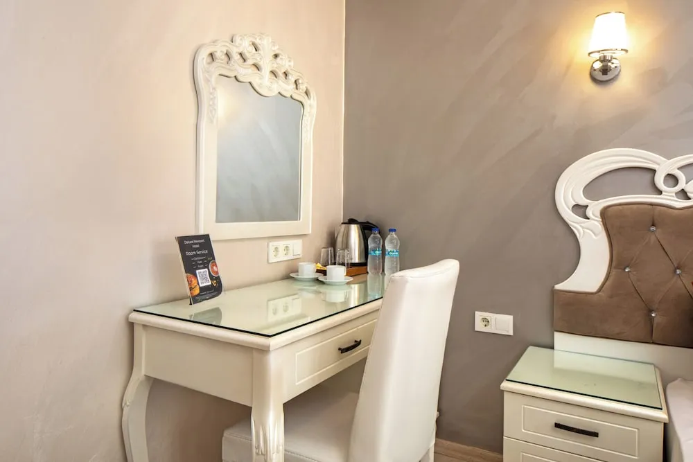 Deluxe Tek Büyük veya İki Ayrı Yataklı Oda