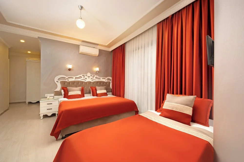 Deluxe Üç Kişilik Oda