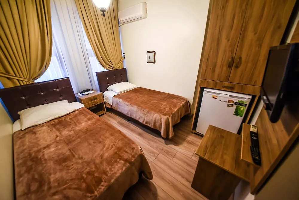 Comfort Tek Büyük veya İki Ayrı Yataklı Oda