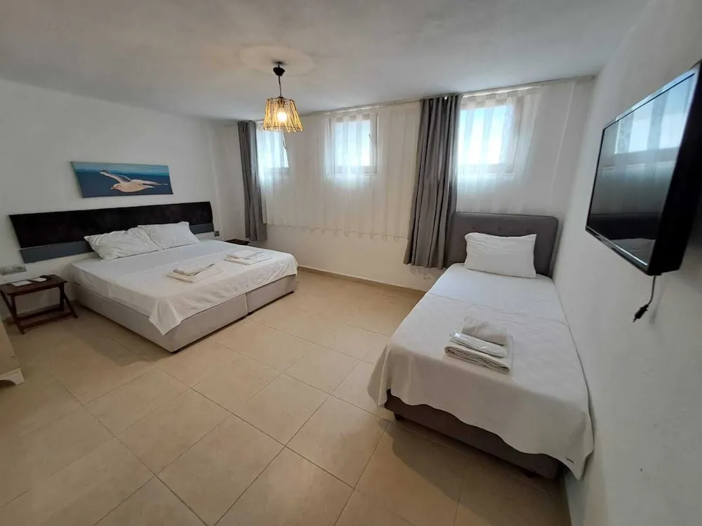 Economy Üç Kişilik Bodrum Kat Oda
