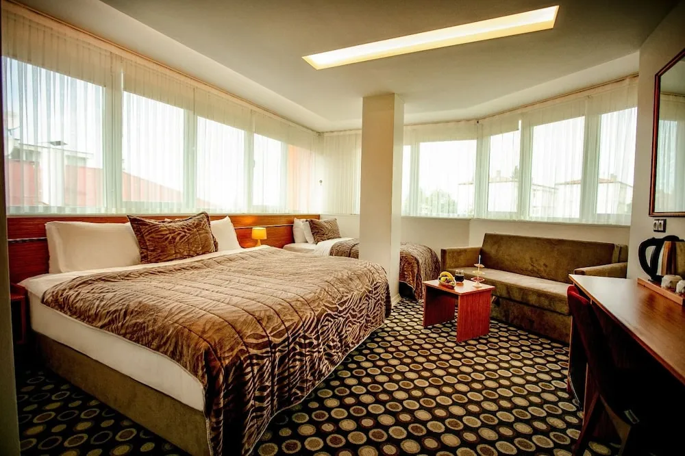 Deluxe Üç Kişilik Oda
