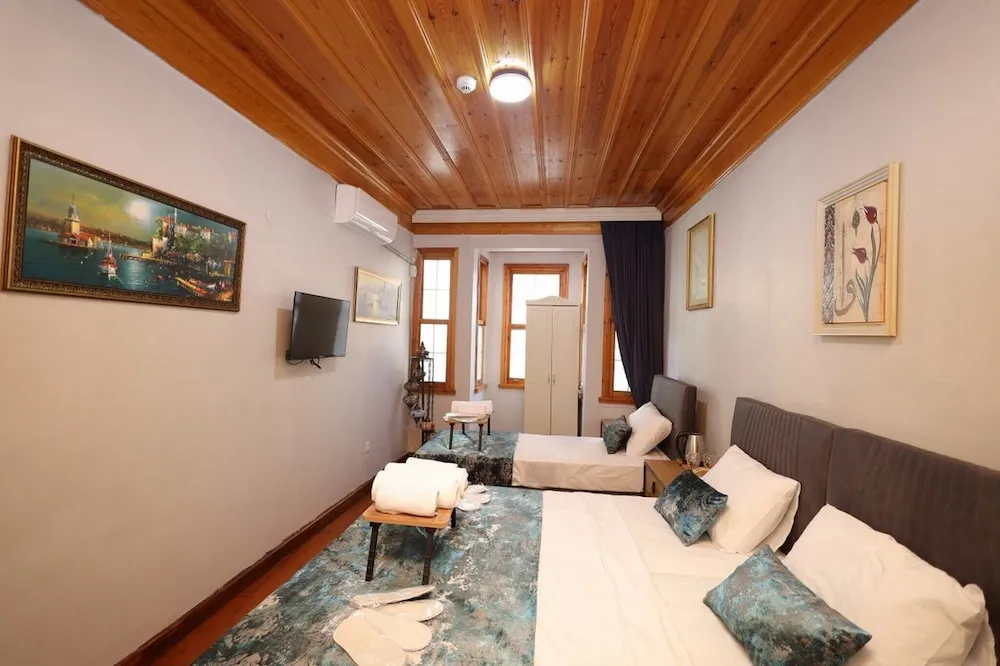 Deluxe Üç Kişilik Oda