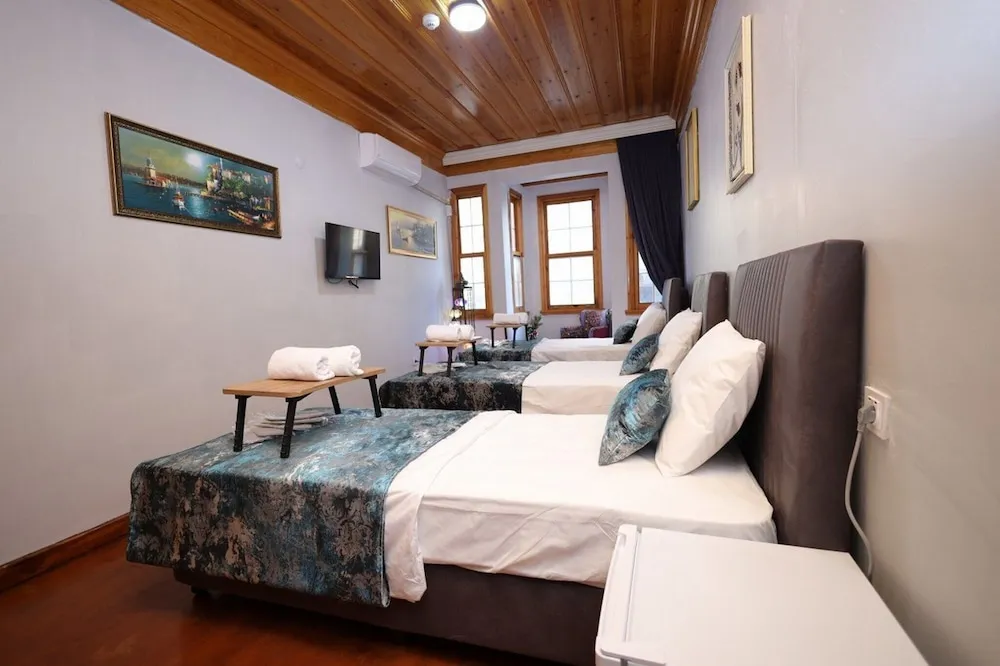 Deluxe Üç Kişilik Oda