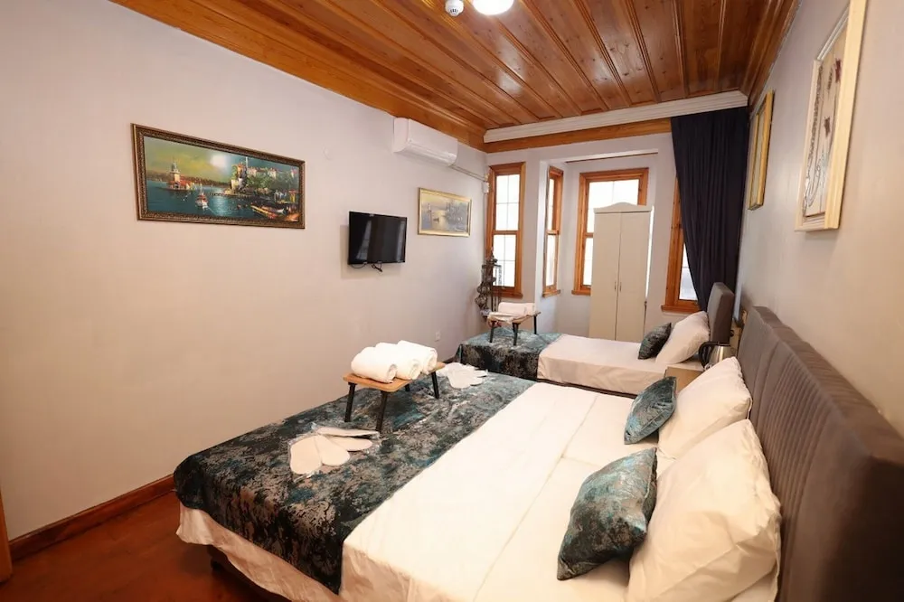 Deluxe Tek Büyük veya İki Ayrı Yataklı Oda
