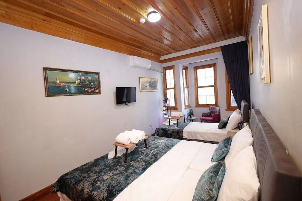 Deluxe Tek Büyük veya İki Ayrı Yataklı Oda