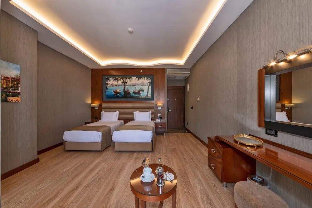 Deluxe Tek Büyük veya İki Ayrı Yataklı Oda