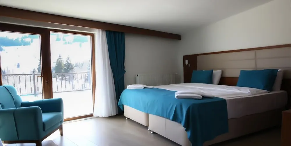 Exclusive Tek Büyük veya İki Ayrı Yataklı Oda