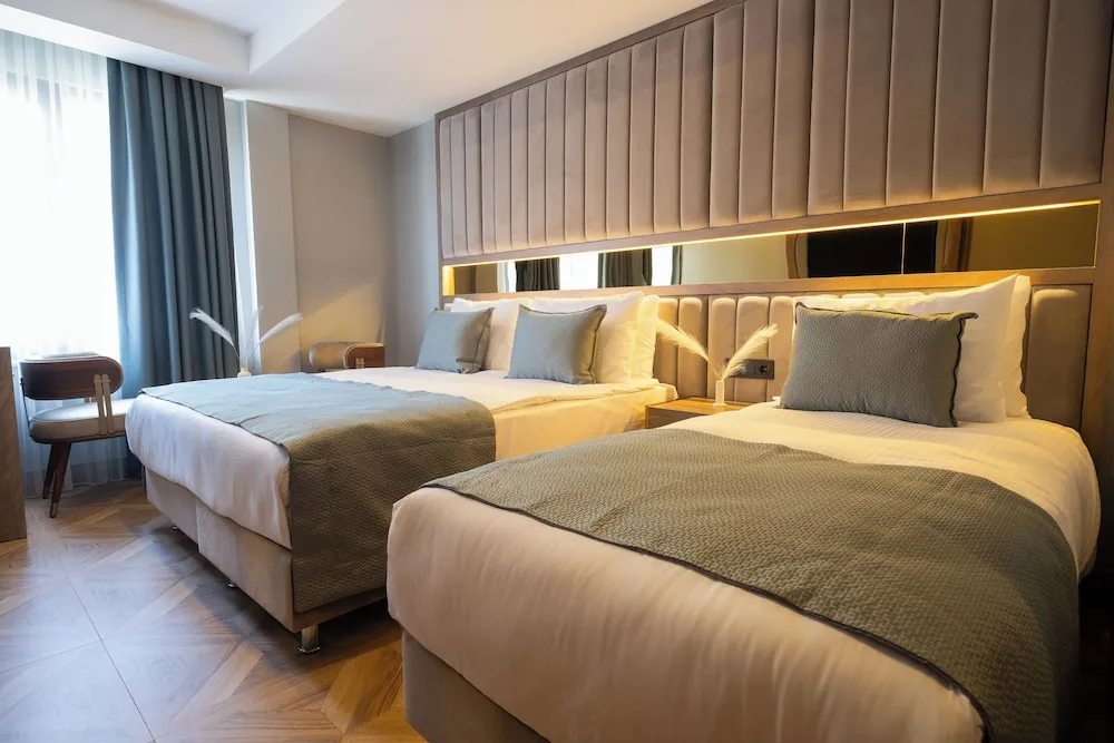 Deluxe Üç Kişilik Oda
