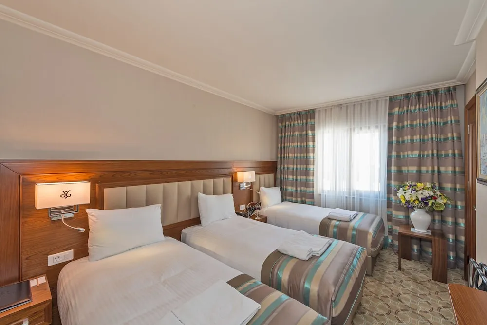 Deluxe Üç Kişilik Oda