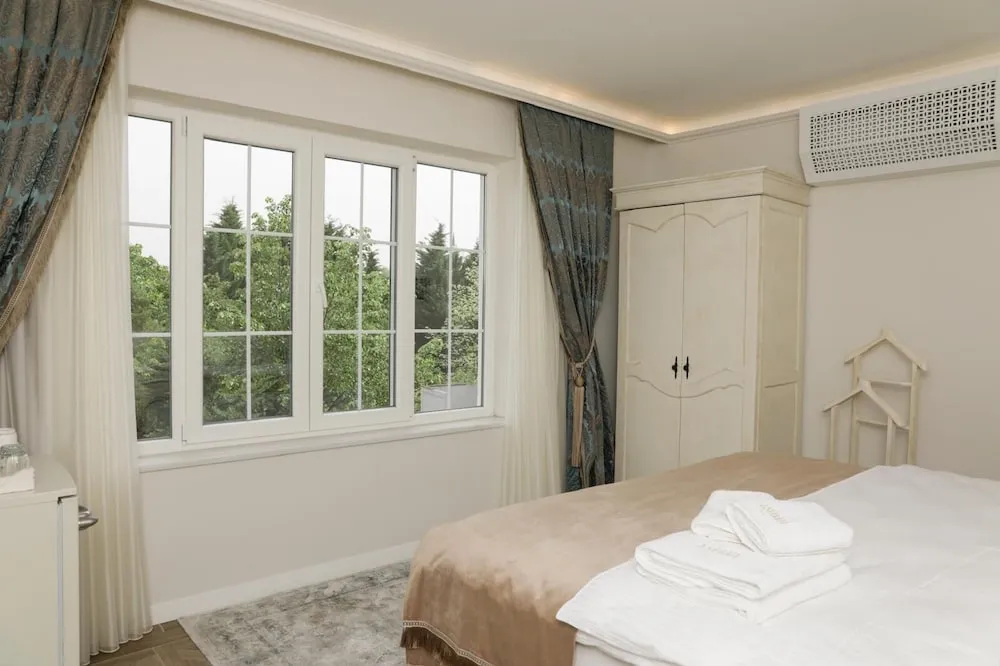 Standard Tek Büyük veya İki Ayrı Yataklı Oda, Bahçe Manzaralı