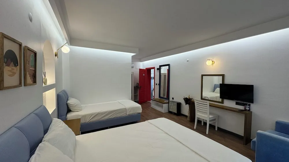 Deluxe 3 Kişilik Verandalı Oda