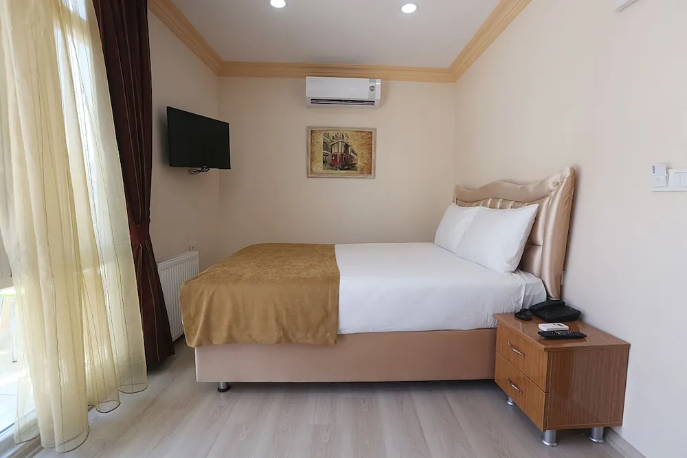 Deluxe Üç Kişilik Oda