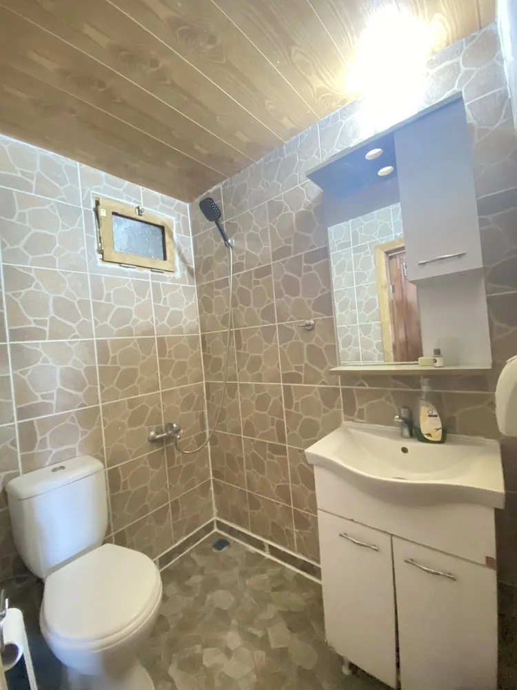 Deluxe Dört Kişilik Oda, Bahçe Manzaralı
