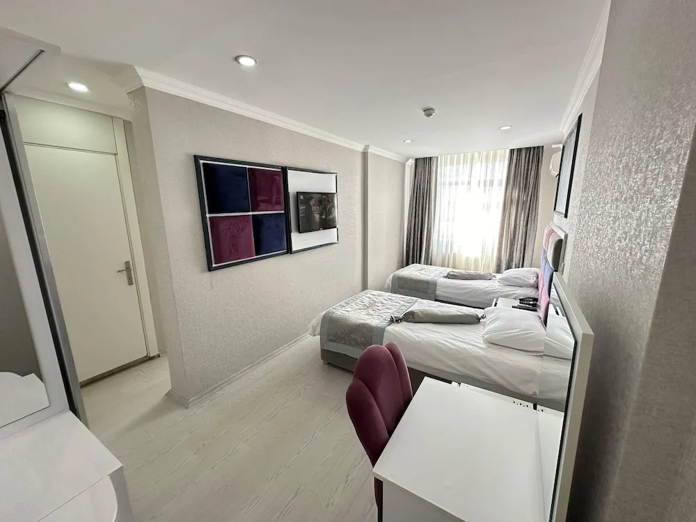 Deluxe Üç Kişilik Oda