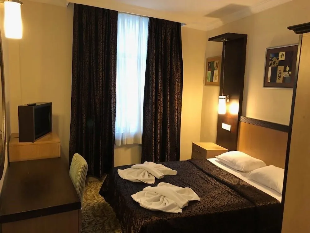 Classic Tek Büyük veya İki Ayrı Yataklı Oda