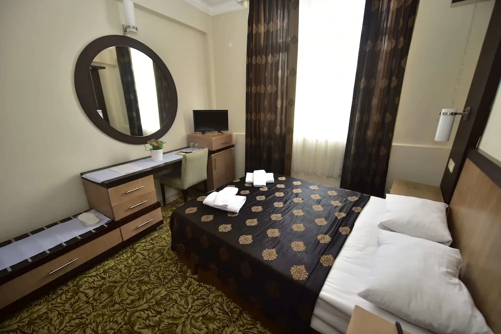 Classic Tek Büyük veya İki Ayrı Yataklı Oda