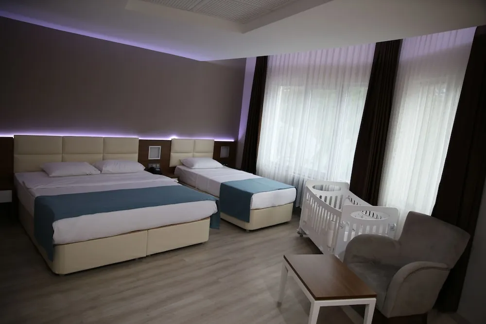 Deluxe Üç Kişilik Oda