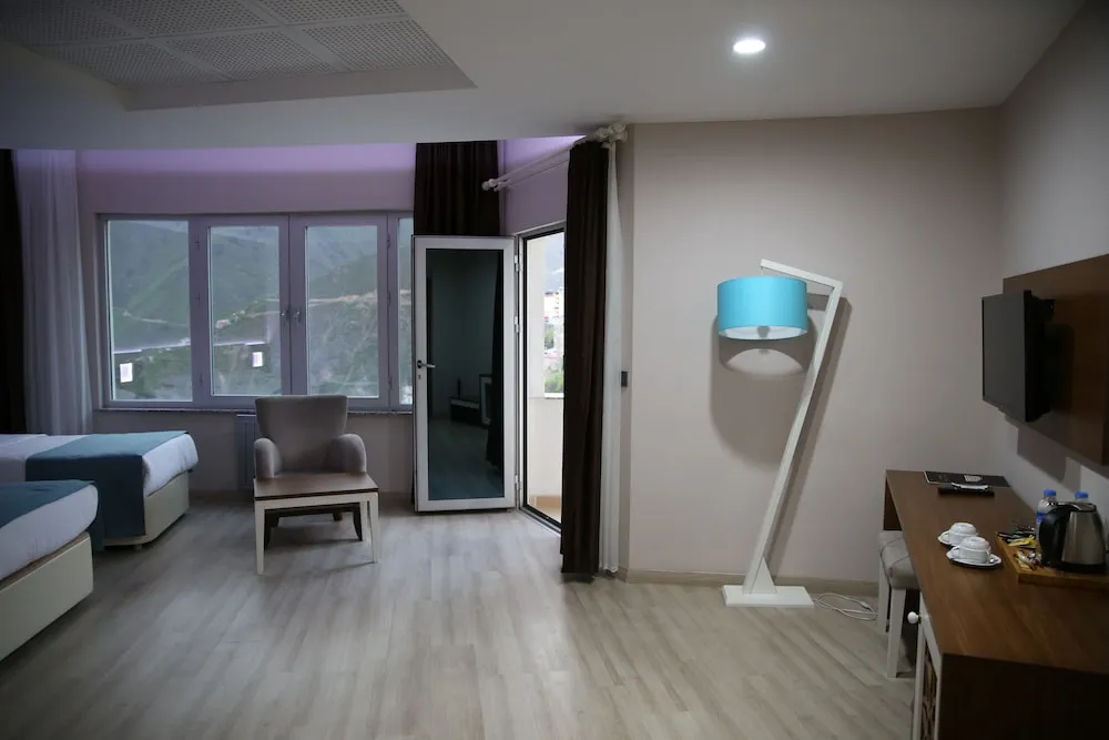 Deluxe Üç Kişilik Oda
