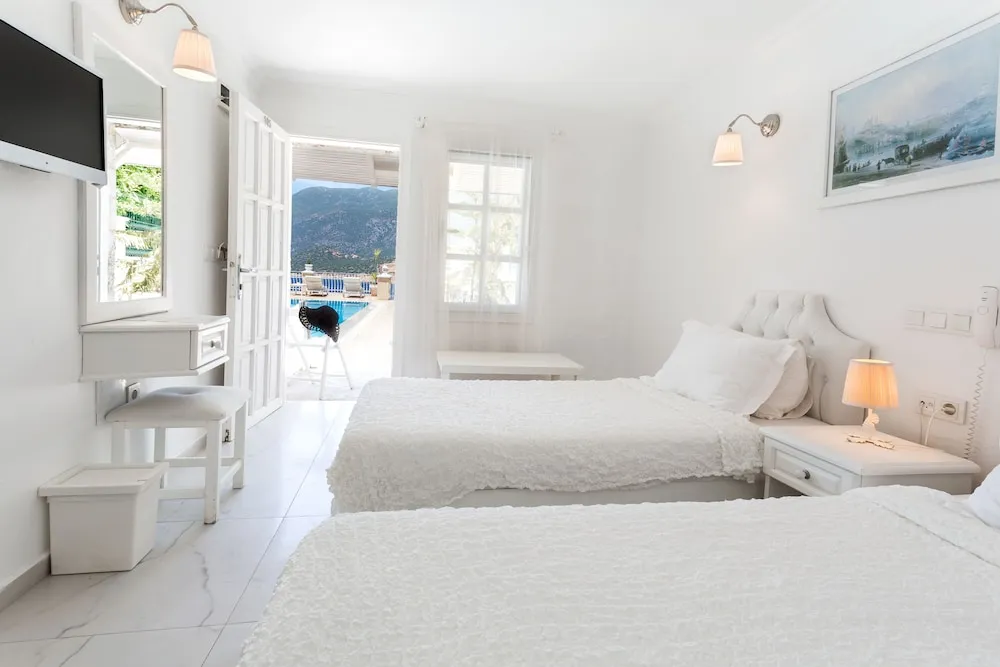 Economy Tek Büyük veya İki Ayrı Yataklı Oda