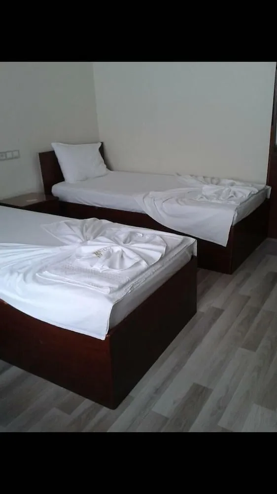 Üç Kişilik Oda