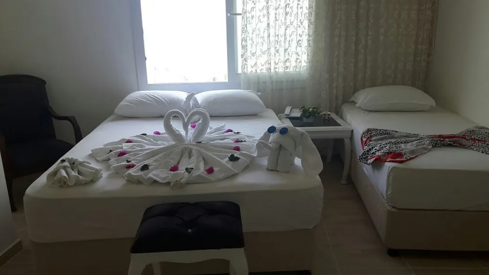 Üç Kişilik Oda
