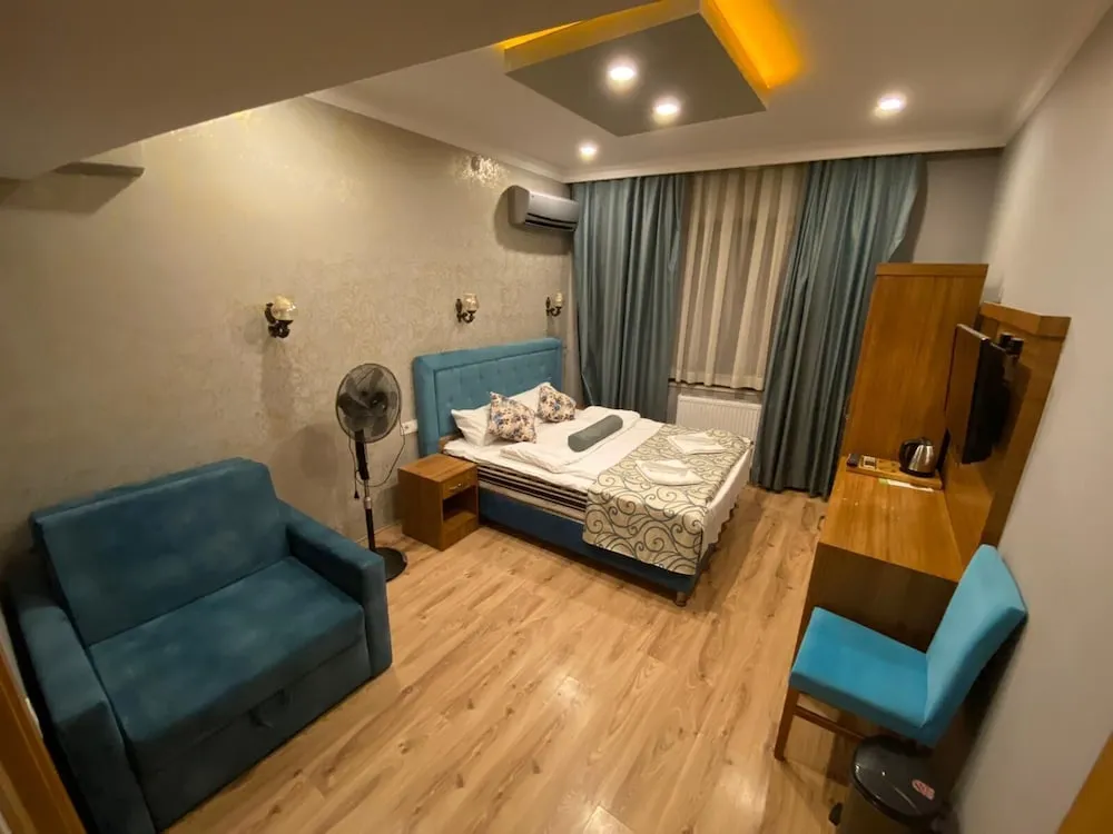 Deluxe Üç Kişilik Oda