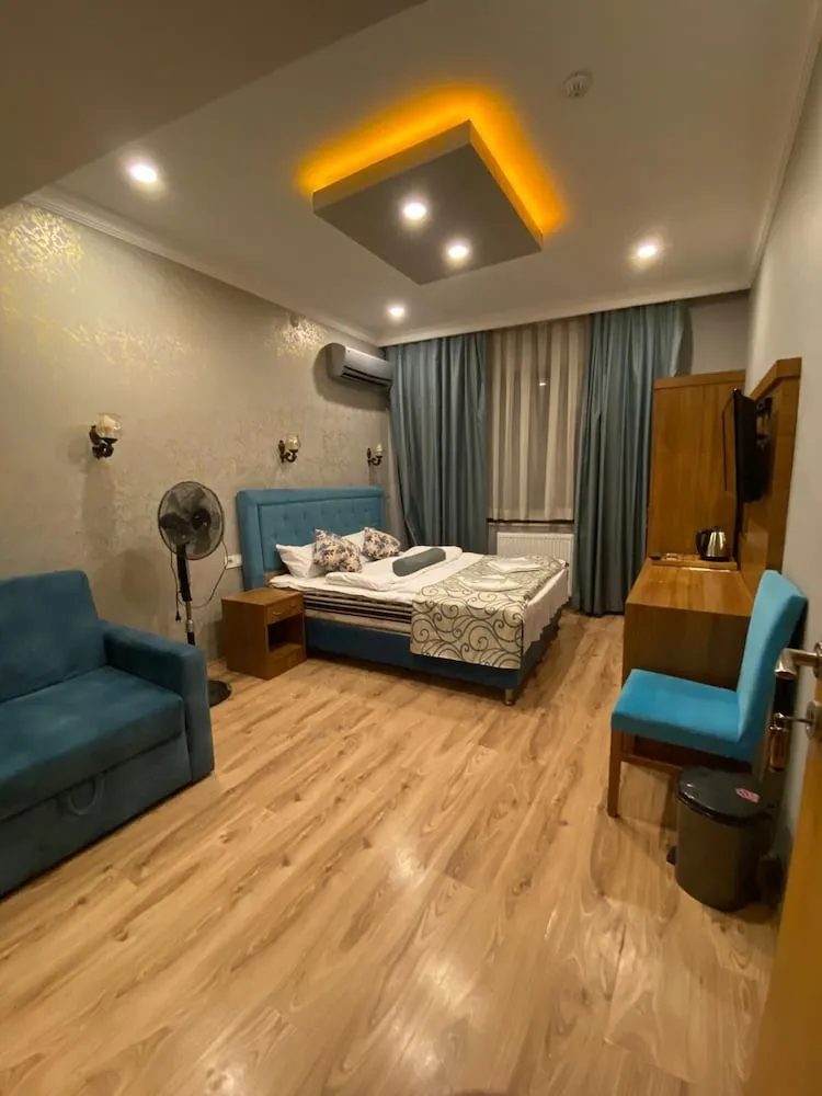 Deluxe Üç Kişilik Oda