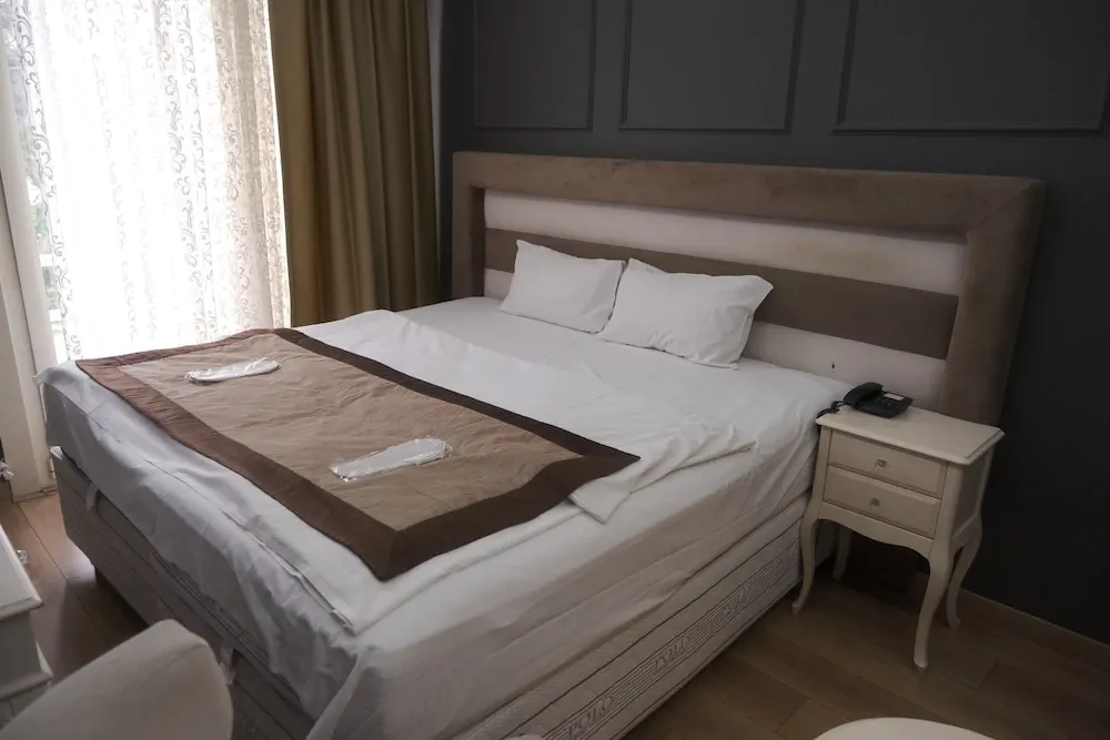 Deluxe Tek Büyük veya İki Ayrı Yataklı Oda