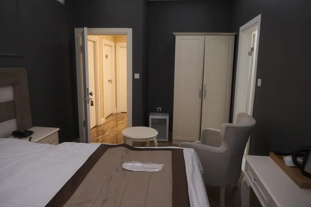 Deluxe Tek Büyük veya İki Ayrı Yataklı Oda